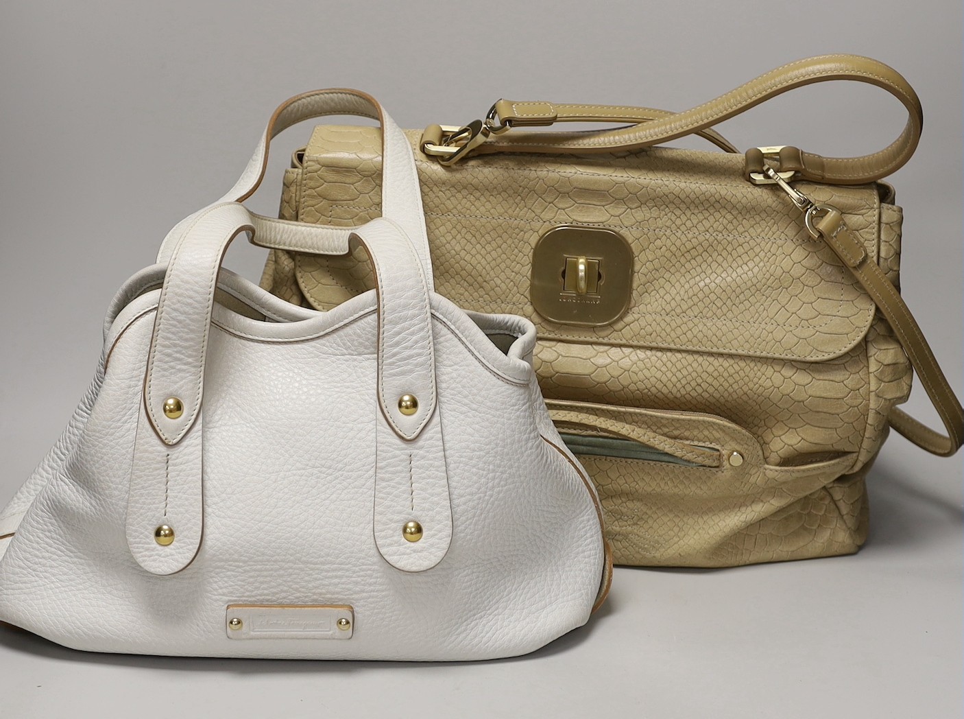 A buffalo tan leather Longchamp Women’s bag, together with a white leather Salvatore Ferragamo Women's shoulder bag. Both with original dust bags